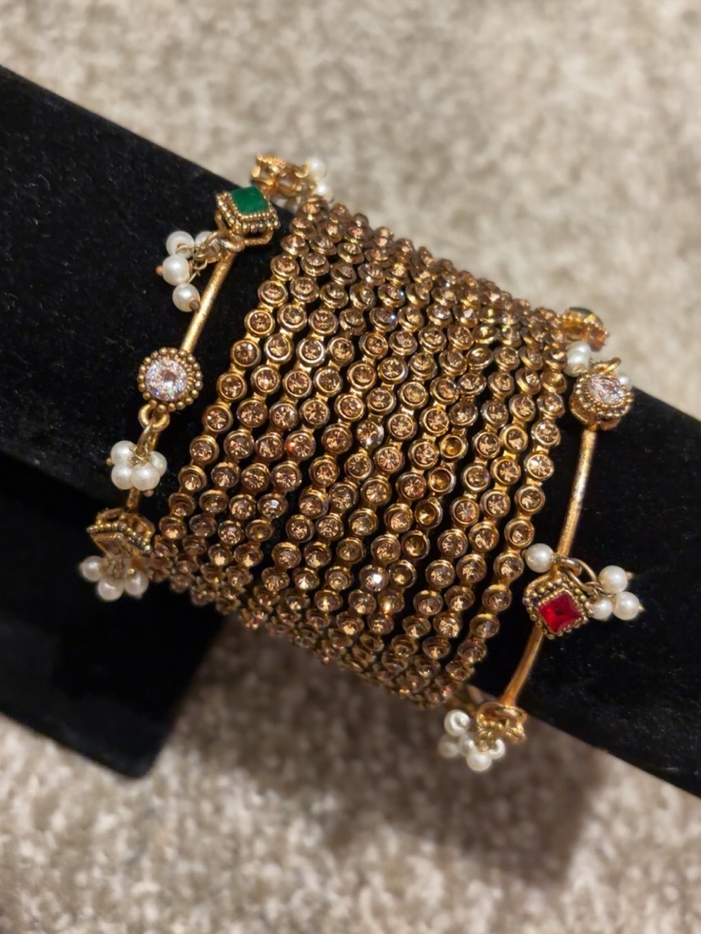 Gold-Tone Multi-Row Kundan-Style Bracelet with Red & Green Accents